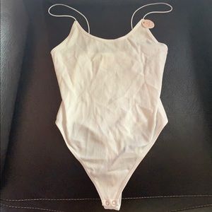 white thong body suit